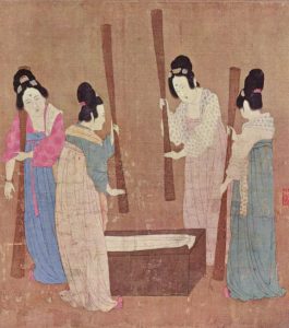 Ancient Chinese court ladies pounding silk fabric
