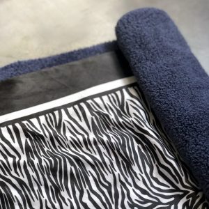 Wet silk scarf drying in a towel